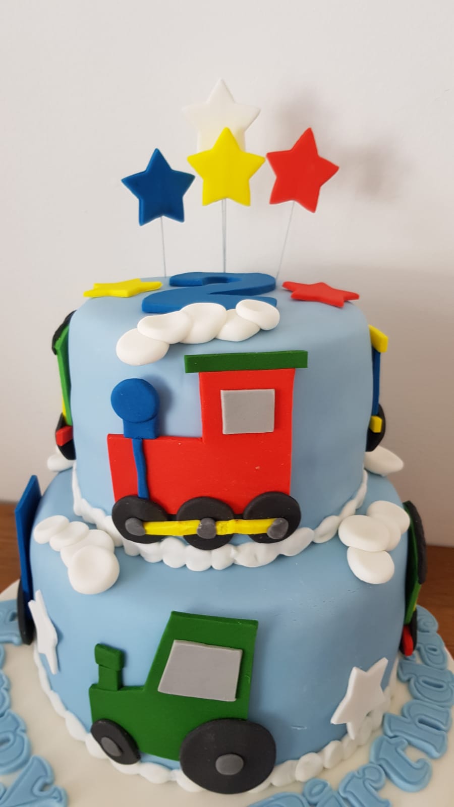Train  and Tractor cake - 10 inches and 8 inch round tiers